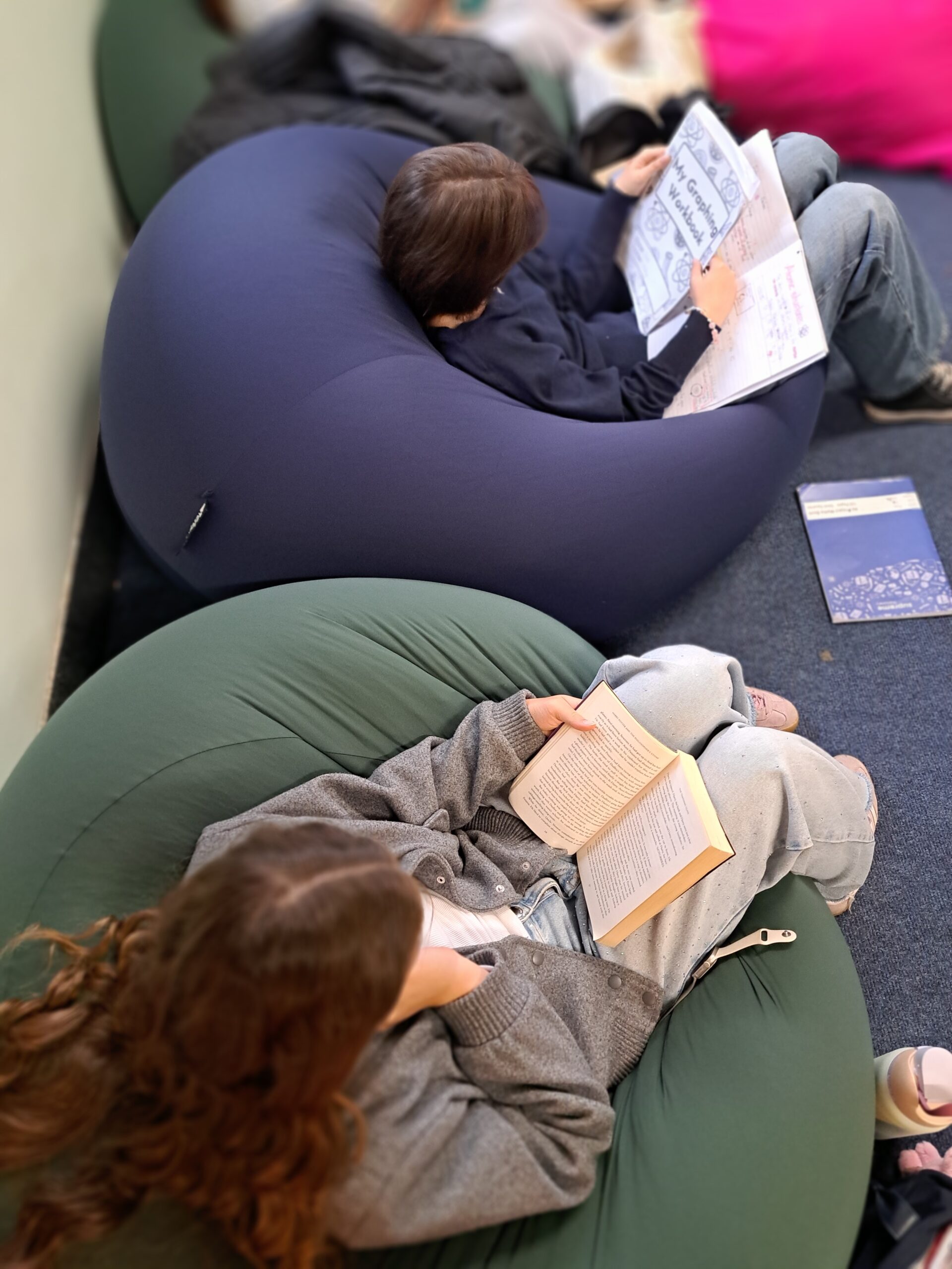 Primary school children learning together in a classroom